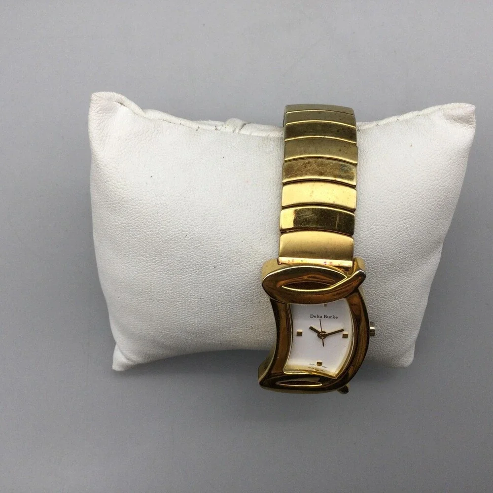 Delta Burke Womens Watch 25mm Gold Tone Asymmetrical Stretch Band New Battery